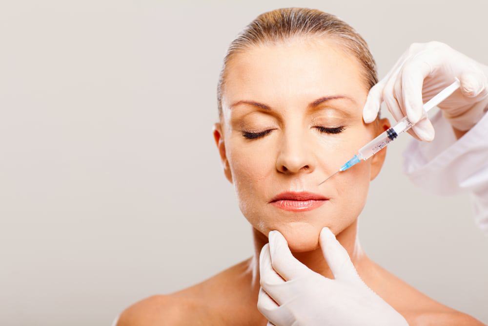 Old Lady Getting Injection On Face | LA Ageless Medical Aesthetics in Beverly Hills