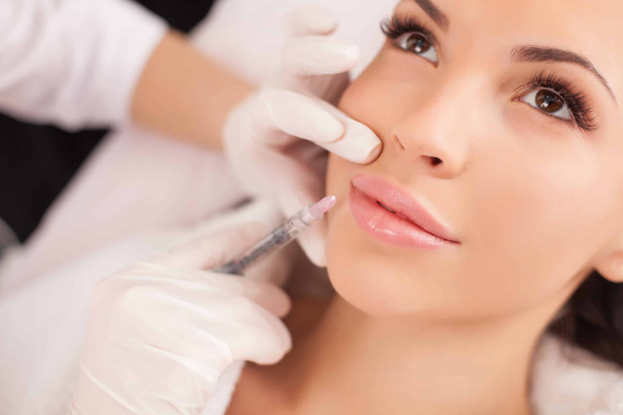 Young female getting Lip injection | LA Ageless Medical Aesthetics in Beverly Hills