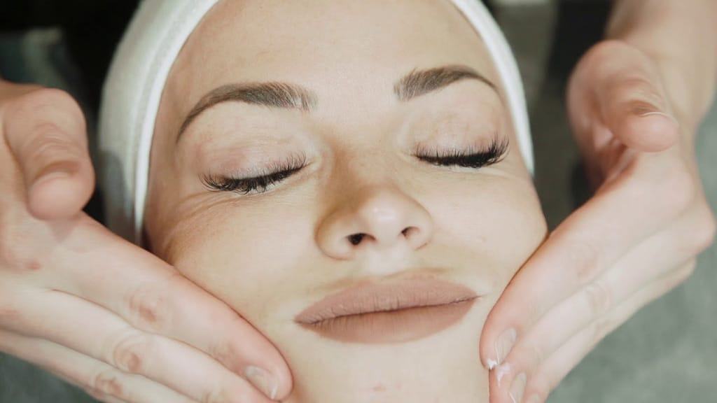 Young woman getting Facial massage | LA Ageless Medical Aesthetics in Beverly Hills
