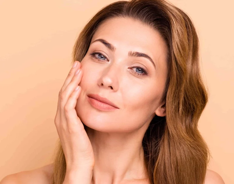Woman showing smooth, wrinkle-free skin after Botox_Dysport Services in Beverly Hills, CA.